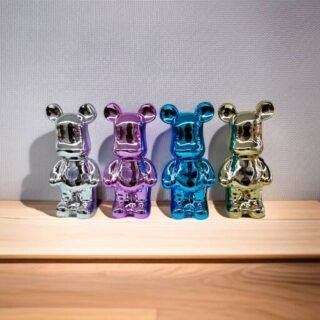 estatuilla  decorativa de ceramica con diseño de astronauta